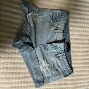 Distressed denim shorts